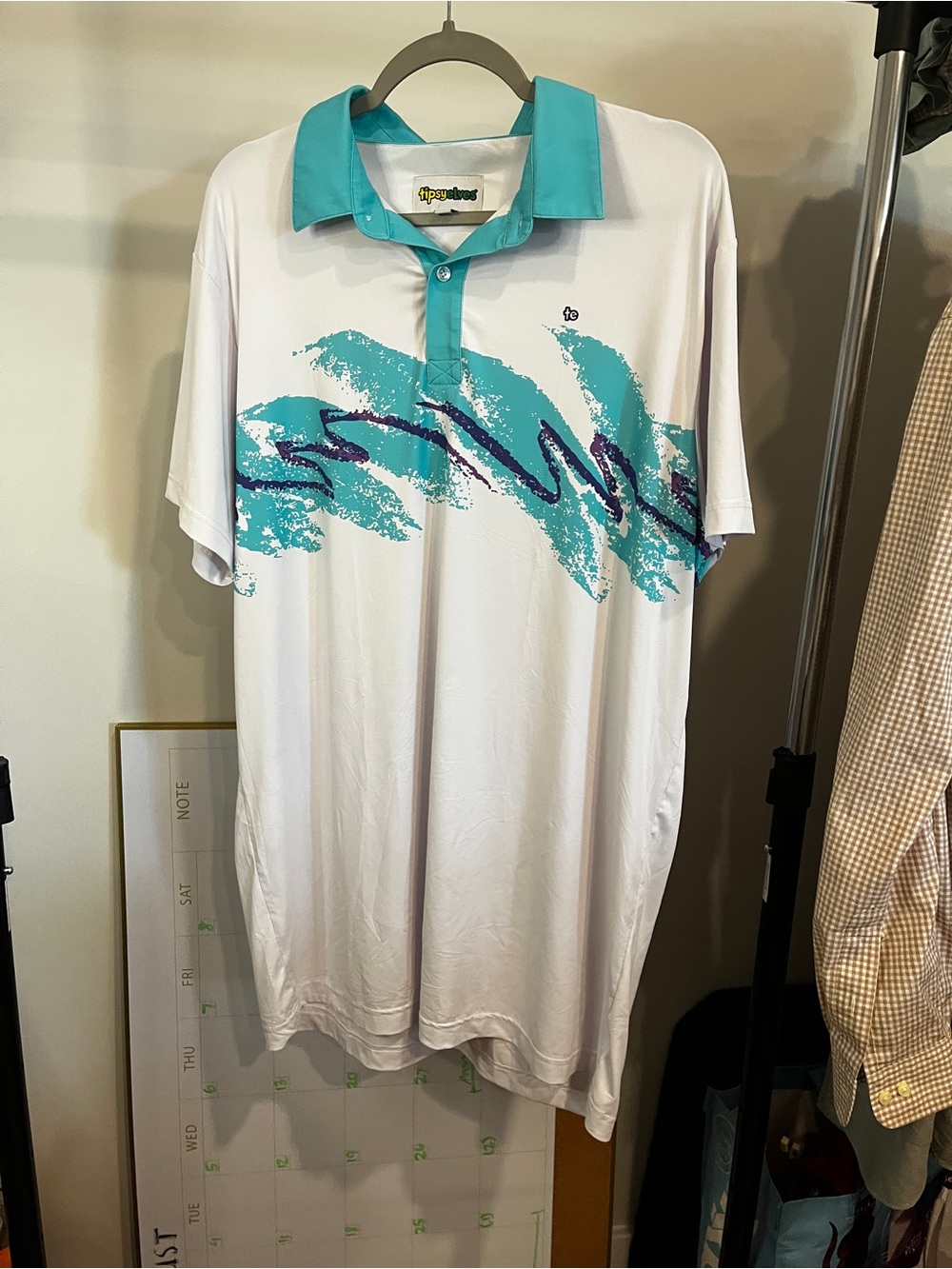 Tipsy Elves White Polo with Teal and Purple Wave Graphic